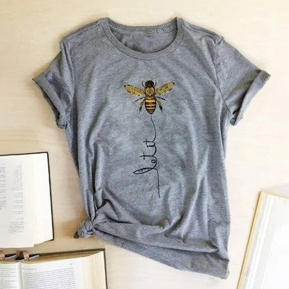 Close-up of the Bee Kind Women's Graphic Tee by Dazzling Dreams Studio, showcasing the soft fabric texture and unique graphic conveying kindness.