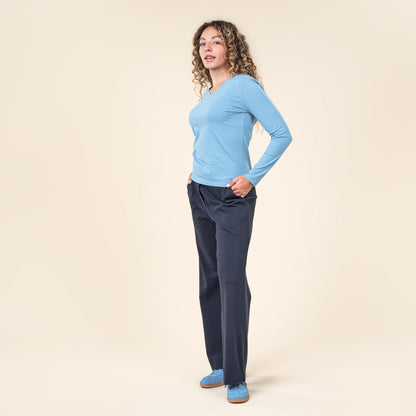 Elegant luxury organic cotton long sleeve V-neck top for women by Earth Wardrobe, showcasing a modern and comfortable fit.