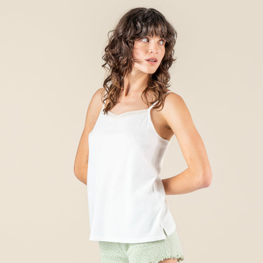 Elegantly designed organic cotton night vest showcasing a low-cut back and lightweight texture for a luxurious nighttime experience.