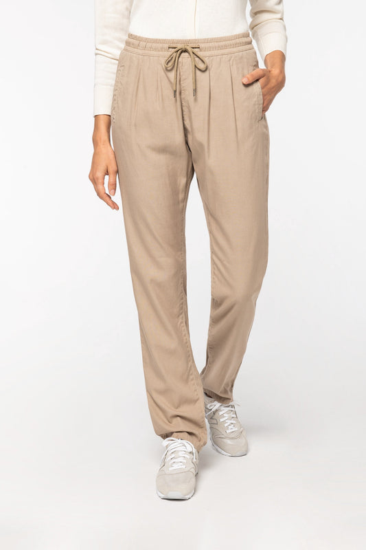 Luxurious women’s Tencel trousers featuring a casual fit and elasticated waist, designed with a soft peach-skin finish for ultimate comfort.