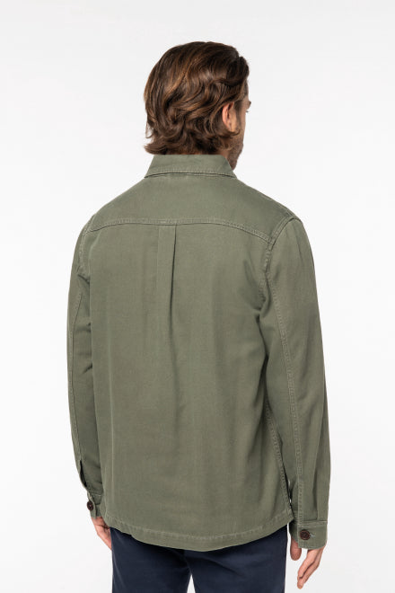 Model wearing a luxury faded wash organic cotton and linen jacket, exemplifying style and comfort in a regular fit.