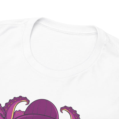 Chic flat lay of a vibrant skeleton t-shirt paired with a cap, featuring bold aquatic motifs and a captivating colour palette.