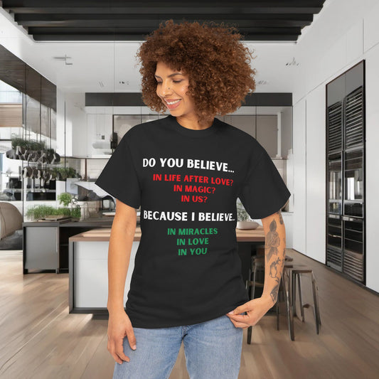 Urban Unisex Cotton Lyrics Graphic T-Shirt worn by a fashionable individual in a modern kitchen, highlighting its appeal for music enthusiasts.