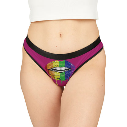 Elegant women's thong featuring a vibrant graphic design of rainbow lips against a striking pink background, perfect for playful and sassy romantic occasions.