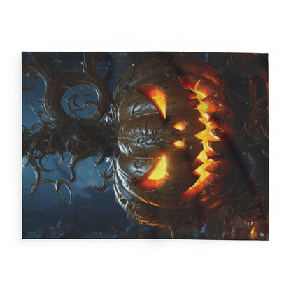 Elegant Decorative and Warm Halloween Spooky Arctic Fleece Blanket featuring a dramatic view of a jack-o'-lantern, enhancing the charm of your Halloween festivities with luxury and comfort.