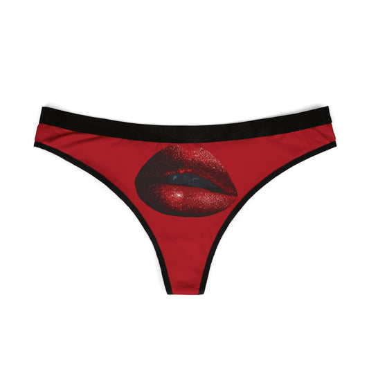 Sophisticated women's thong showcasing a vibrant graphic of glittering red lips, perfect for adding a playful flair to romantic gifting.