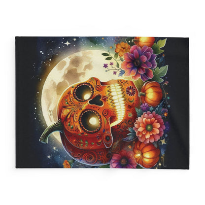 Chic Decorative and Warm Halloween Spooky Arctic Fleece Blanket displaying a stunning pumpkin skull motif with delicate flowers against a starry night, perfect for adding a touch of luxury to your Halloween festivities.