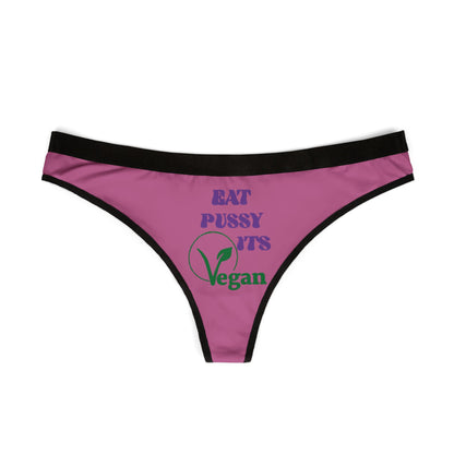 Elegant vegan thong panties showcasing the cheeky phrase 'Eat Pussy, It's Vegan' printed in eye-catching colours on a chic purple background, designed for the bold and playful woman.