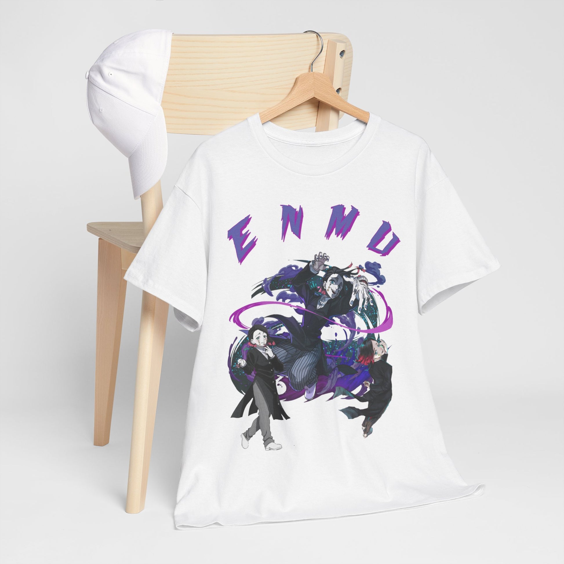 Chic white Enmu-inspired Demon Slayer T-shirt displayed stylishly alongside a cap on a wooden chair, highlighting its eye-catching graphic and vibrant design elements.