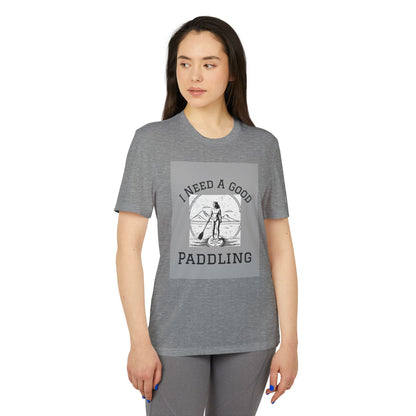 Model wearing the Adidas Women's Eco-Friendly Paddleboarders T-Shirt in Dark Grey with the graphic 'I NEED A GOOD PADDLING', perfect for paddleboarding enthusiasts.