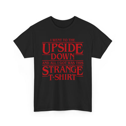 Elegant portrayal of the Stranger Things Unisex Graphic Tee, showcasing vibrant red lettering 'I WENT TO THE UPSIDE DOWN AND ALL I GOT WAS THIS STRANGE T-SHIRT' against a classic black fabric, ideal for stylish fans.