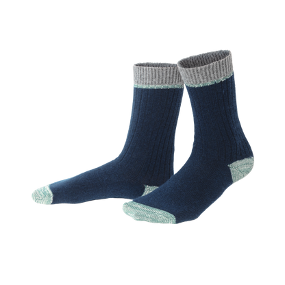 Close-up view of luxurious organic wool and cotton socks featuring adaptable rib knit, perfect for maintaining warmth during winter.
