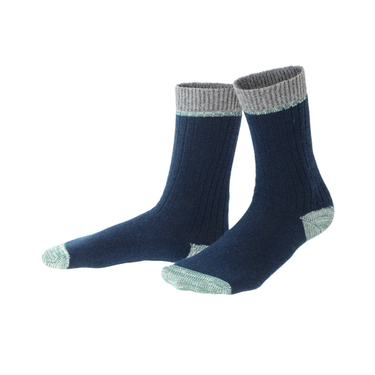 Close-up view of luxurious organic wool and cotton socks featuring adaptable rib knit, perfect for maintaining warmth during winter.