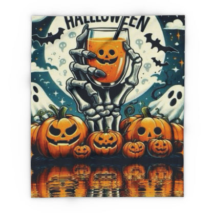 Decorative and Warm Halloween Spooky Arctic Fleece Blanket featuring a spooky skeleton hand holding a pumpkin-themed drink, surrounded by jack-o'-lanterns and a full moon backdrop.