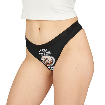 Stylish black women's thong being modelled, beautifully displaying the cheeky graphic 'POUND MY CAKE DADDY' for a fun, luxurious addition to romantic occasions.