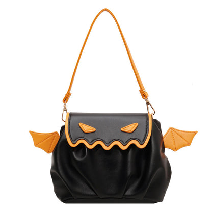 Sophisticated Funny Crossbody Bag - Halloween Pumpkin Cartoon Design in black with vibrant orange accents, capturing a whimsical yet luxurious aesthetic.