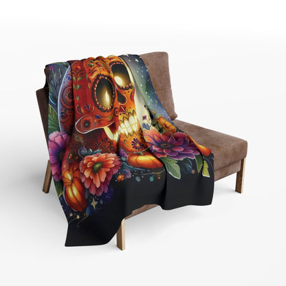 Sophisticated Decorative and Warm Halloween Spooky Arctic Fleece Blanket draped over a modern chair, exemplifying luxury and seasonal elegance.