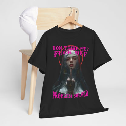 Tasteful black T-shirt draped over a wooden chair, featuring a bold graphic of a gothic nun alongside provocative pink text that reads "DON'T LIKE ME? FUCK OFF" and "PROBLEM SOLVED", epitomising edgy luxury streetwear.