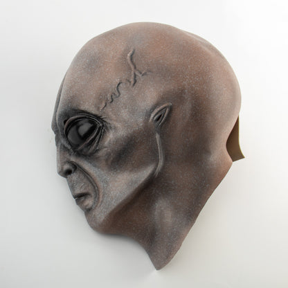 Side profile of the exquisite Realistic Grey Alien Mask latex headgear, demonstrating its unique features, perfect for Halloween and costume parties, available in all sizes.