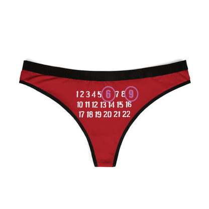 Luxurious red thong featuring a playful design with the bold numbers '6' and '9' highlighted in pinkish-purple, surrounded by a series of elegant white numbers.