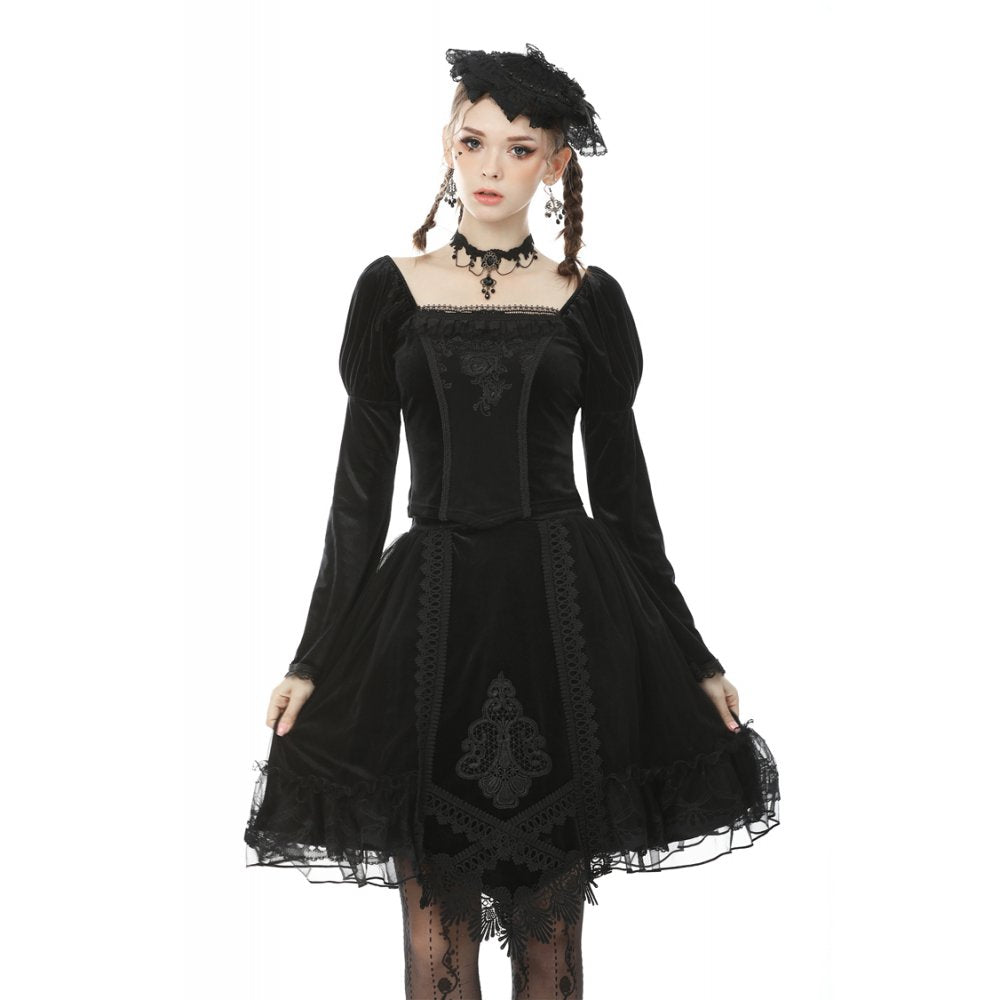 Back view of the Melisandre velvet mesh skirt displaying its layered mesh panels and lace trim, perfect for alternative fashion enthusiasts.