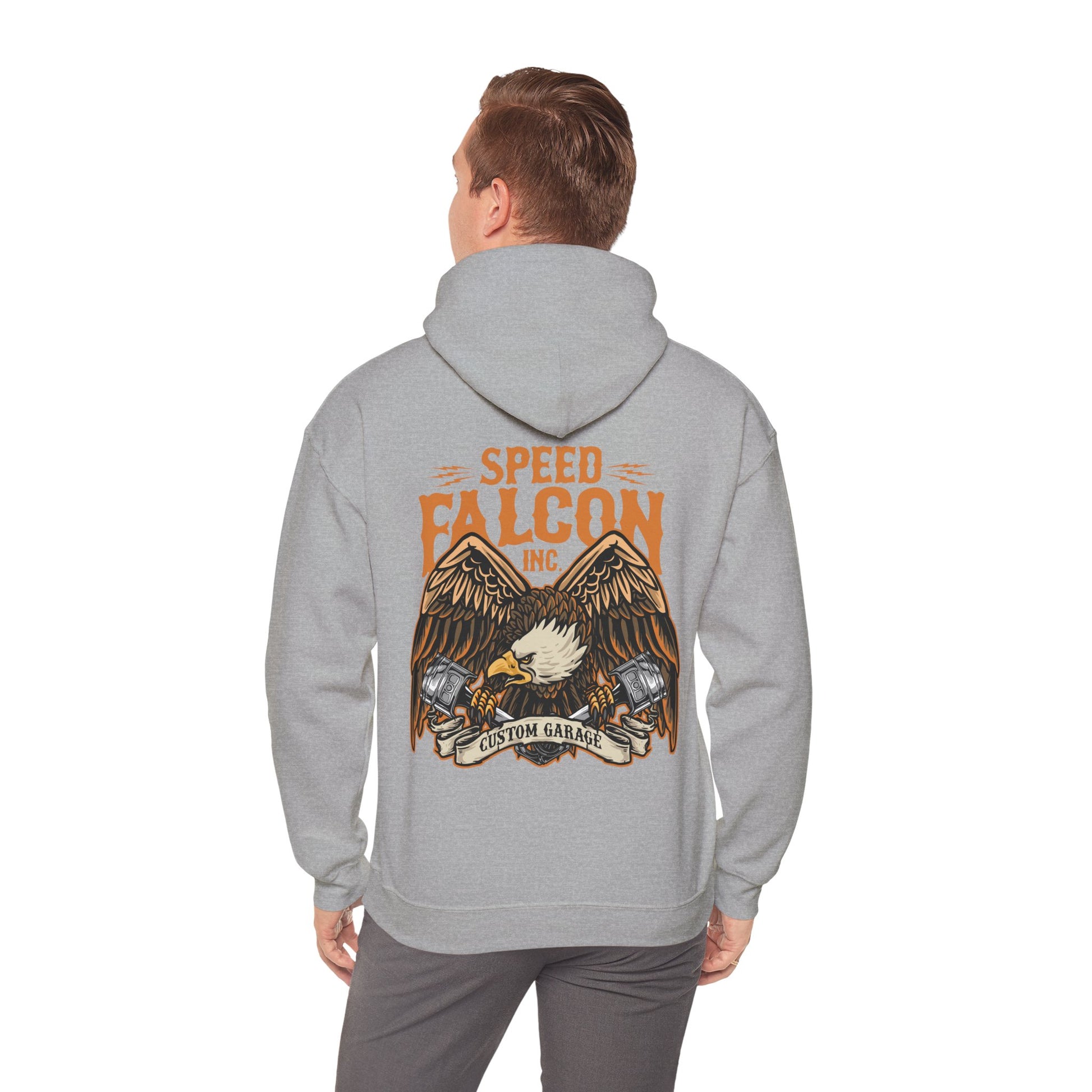 Man wearing a premium grey hoodie featuring intricate eagle graphic and 'Speed Falcon Inc' branding on the back.