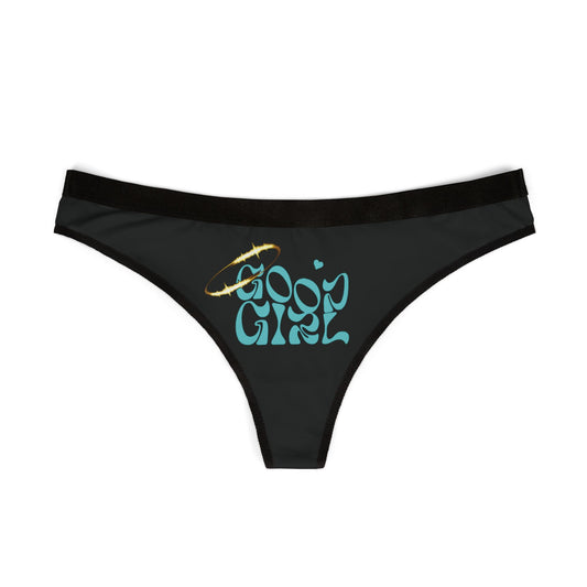 Chic black thong underwear showcasing a bold 'Good Girl' graphic and delicate halo accent, designed for a modern, empowered feminine look.
