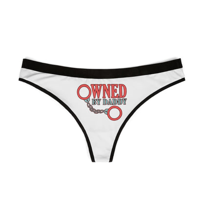 Stylish white women's thong with a bold 'Owned By Daddy' graphic, designed to blend humour and luxury for an alluring statement.