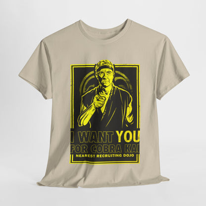 Luxurious graphic T-shirt featuring a martial arts design with the phrase 'I want you for Cobra Kai' in vibrant yellow against a soft beige background, evoking nostalgia and humour for fans of the series.
