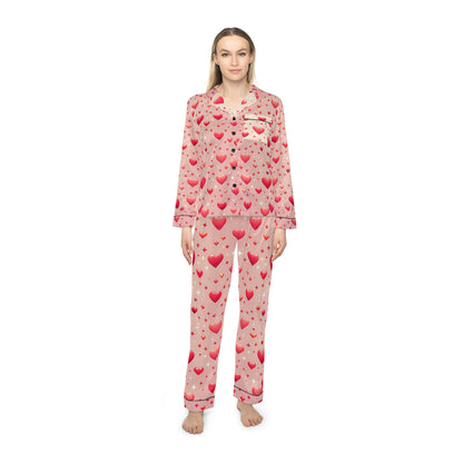 Luxury Women's Satin Pajamas Set with Custom Design, Notch Lapel and Drawstring Waist, modelled by a woman wearing a heart-patterned satin ensemble, reflecting style and sophistication for home relaxation.