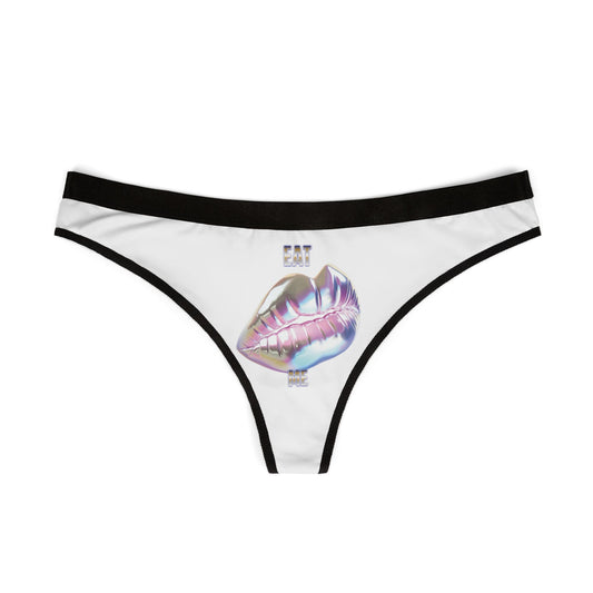 Luxurious women's thong with a holographic lip design stating 'EAT ME', perfect for adding a touch of cheeky elegance to your lingerie collection.