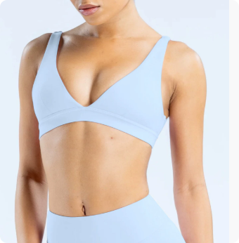 Elegant women's sports bra by Dropsure featuring quick-drying properties and impeccable seam construction for enhanced performance.