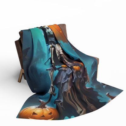 Elegant Decorative and Warm Halloween Spooky Arctic Fleece Blanket draped over a stylish chair, featuring a captivating skeleton and pumpkin design for festive charm.