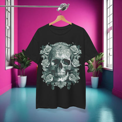 The Skulls and Roses Cotton Tee elegantly displayed on a hanger against a vibrant pink backdrop, highlighting its unique design for alternative style lovers.