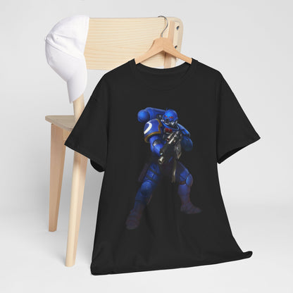 Elegant black graphic cotton t-shirt featuring a blue-armoured warrior illustration, styled on a wooden chair with a white cap, perfect for a chic urban outfit.