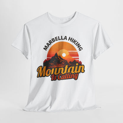 Marbella Hiking Club Unisex Graphic T-Shirt in pristine white, crafted from premium cotton, featuring a striking mountain design and the words 'Mountain Is Calling', ideal for those who embrace the adventure in nature.