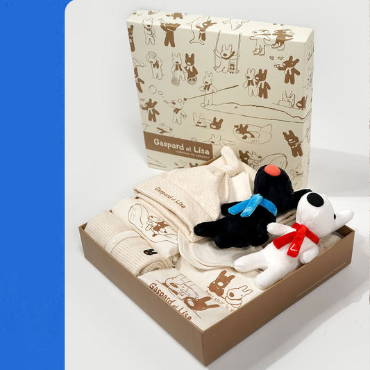 Elegant Newborn Baby Full Moon Gift Baby Clothes displayed in a beautifully packaged gift box alongside plush toys, embodying luxury and comfort for special occasions.