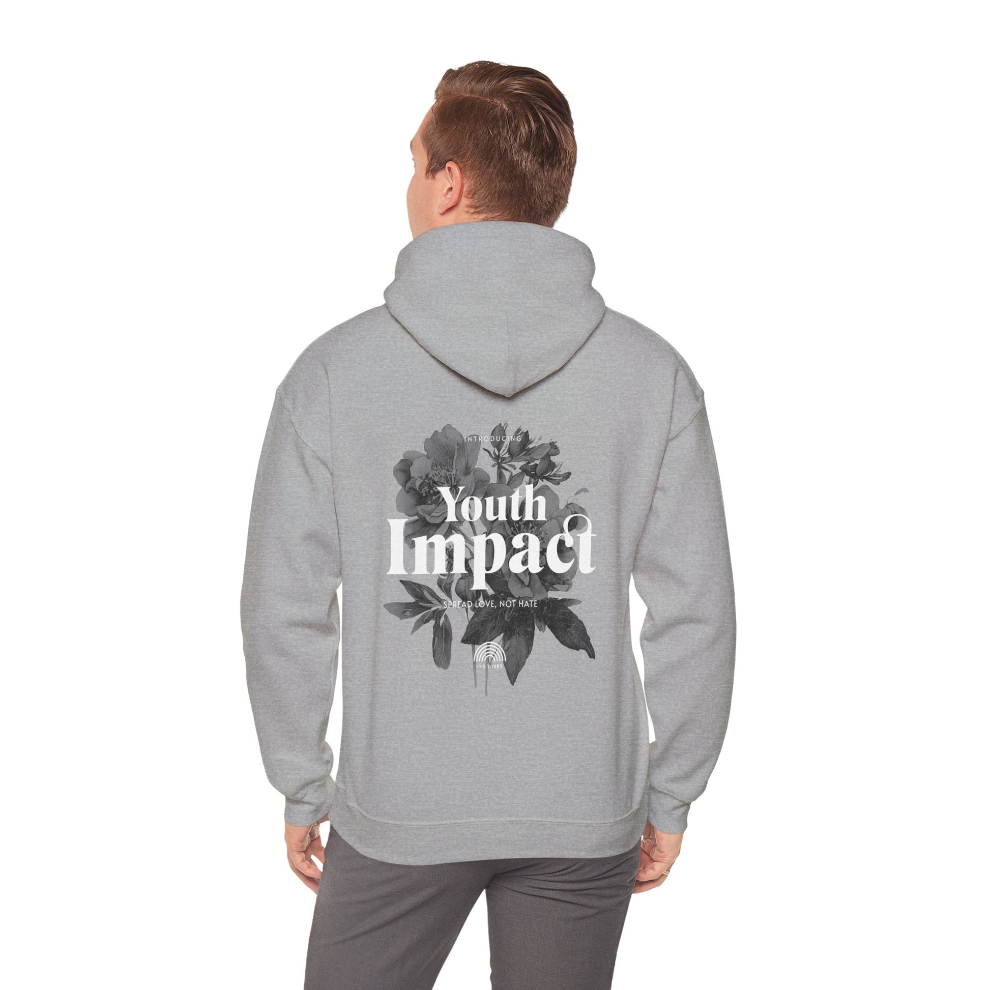 Elegant grey hoodie displayed on a model, featuring a striking back print with the words 'Youth Impact' and a floral design, embodying a message of positivity.