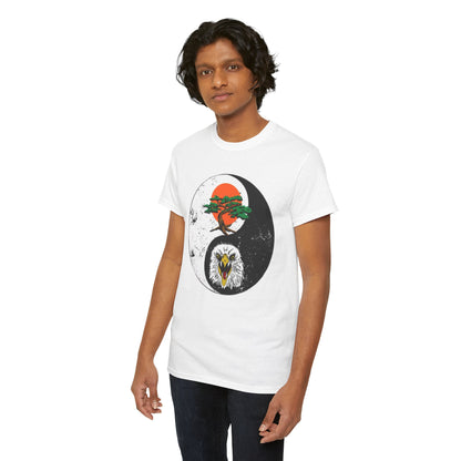 Stylish male model showcasing a classic white graphic tee with a unique yin-yang design, combining the essence of martial arts and philosophy for a luxurious look.