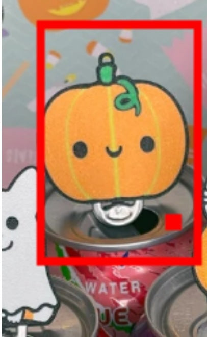 Charming Pumpkin Design Soda Can Tab Opener atop a beverage can, highlighting the whimsical style of the Skull Design Soda Can Tab Opener with Keychain Strap.