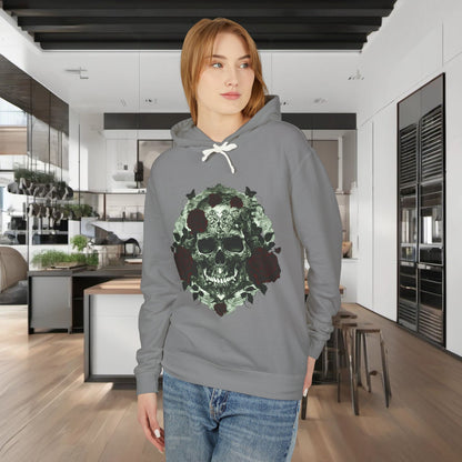 Unisex Lightweight Hooded Sweatshirt showcasing a unique designer skull and roses motif, elegantly styled on a model in a chic kitchen setting.