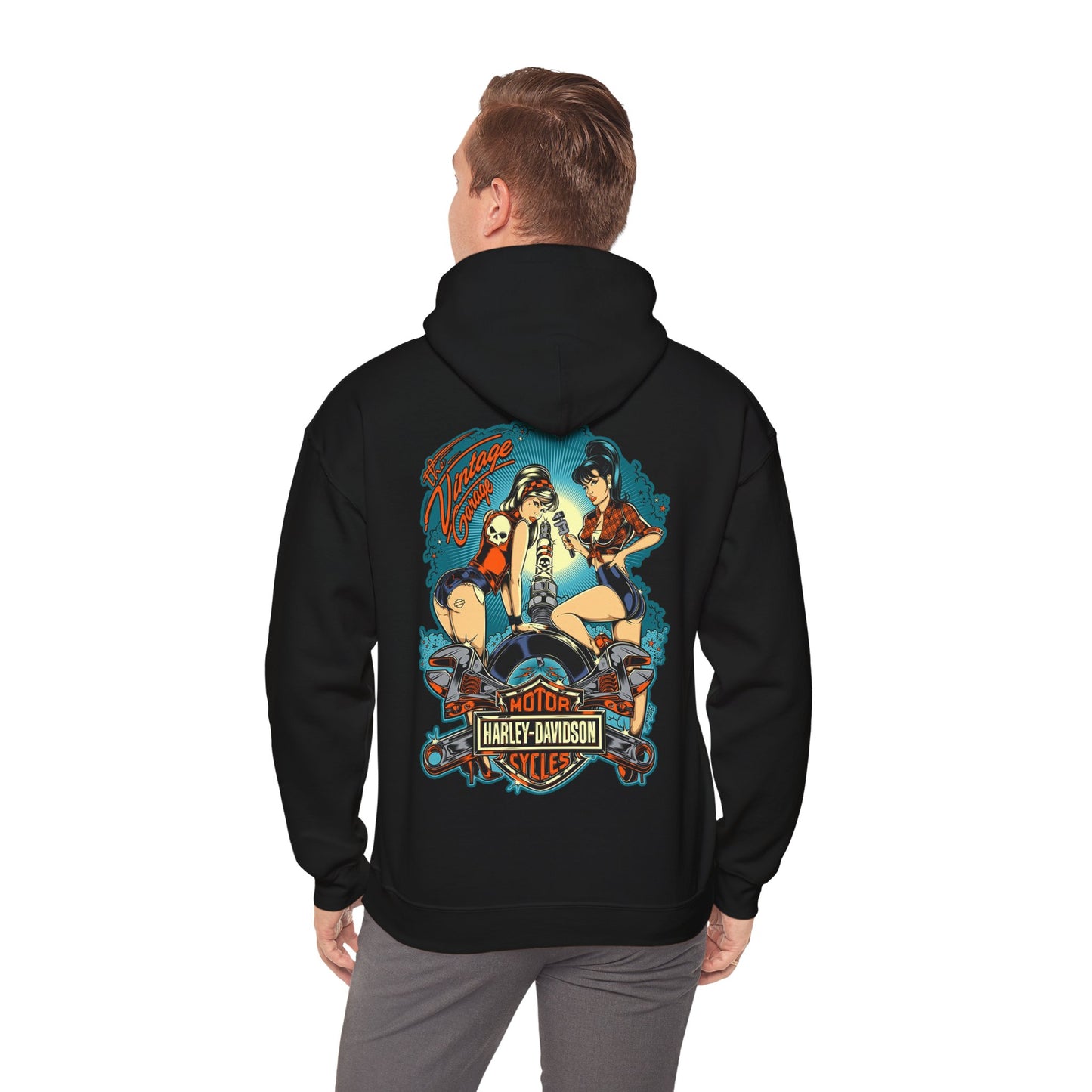 Elegant black vintage hoodie featuring a striking back print of two pin-up women alongside a motorcycle engine, encapsulating retro charm and style.