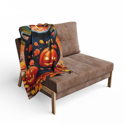 Decorative and Warm Halloween Spooky Arctic Fleece Blanket draped elegantly over a stylish couch, showcasing vibrant Halloween-themed designs featuring pumpkins and autumn leaves.