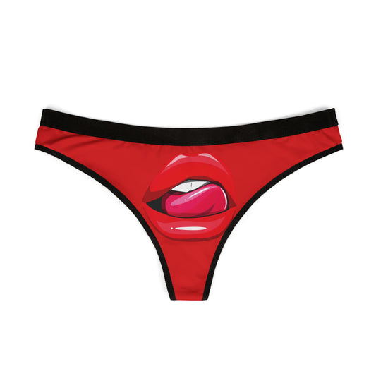 Elegant red women's thong with a striking design, showcasing a close-up of luscious lips and a suggestive pink tongue, perfect for adding a touch of luxury to intimate occasions.