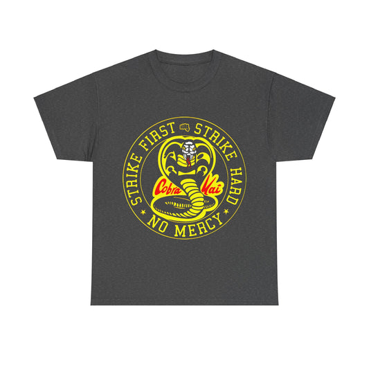 Cobra Kai Graffiti Graphic Unisex T-Shirt in dark grey featuring striking yellow and red cobra logo and the phrase 'Strike First, Strike Hard, No Mercy'. A stylish addition to premium streetwear for enthusiasts.