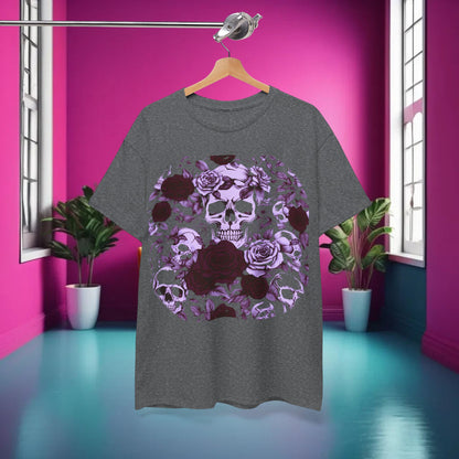 A styled display of the Skulls and Roses Cotton Tee on a hanger in a chic interior, showcasing the striking design of skulls and roses that appeals to alternative fashion lovers.