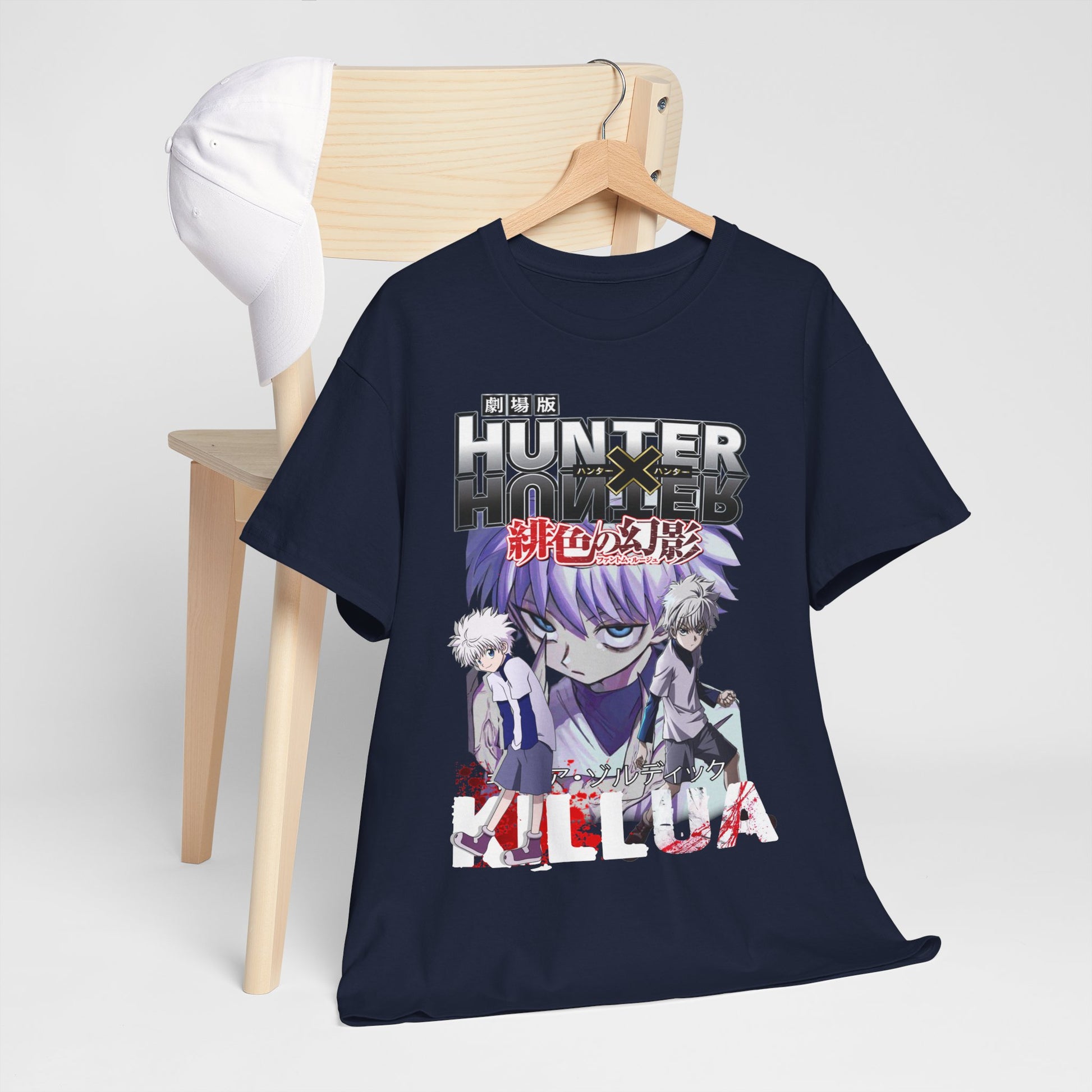 Luxury navy blue graphic t-shirt featuring Killua and Gon from Hunter x Hunter, showcasing intricate artwork and vibrant colours on a stylish wooden chair.
