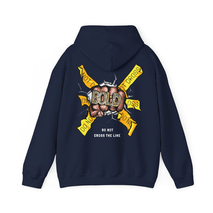 Elegant navy hoodie featuring a striking graphic of a fist holding a diamond ring with 'BOLD', accented by yellow caution tape stating 'DO NOT CROSS THE LINE'. A statement piece for sophisticated fashion.