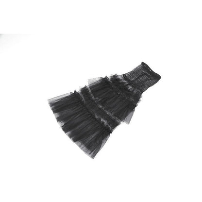 Dark in Love Ophelia Tiered Tulle Knee-High Socks styled with a mini skirt and platforms, embodying alternative fashion.