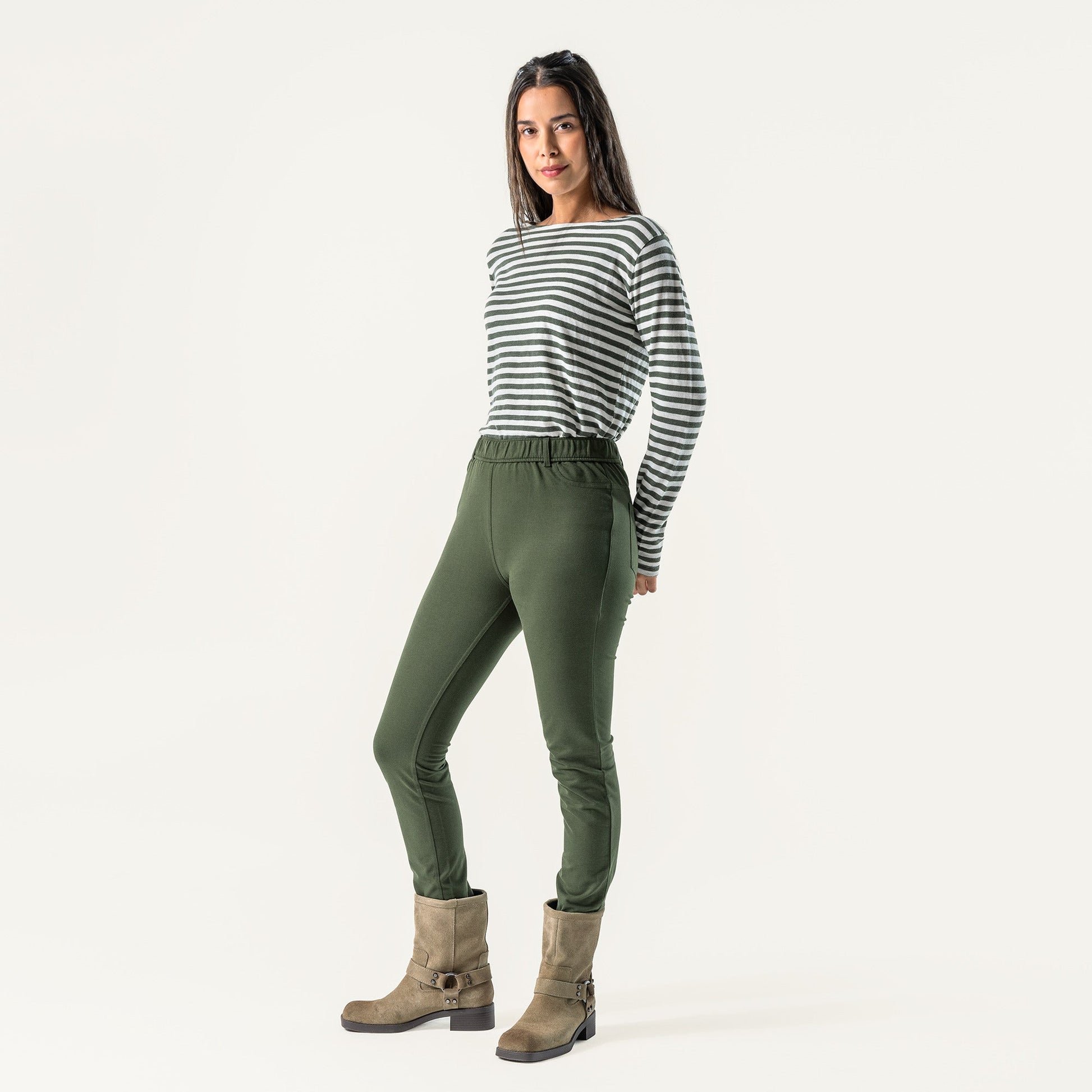 Side view of luxury organic cotton trouser leggings for women, highlighting the flattering fit and slight stretch of the jersey fabric.